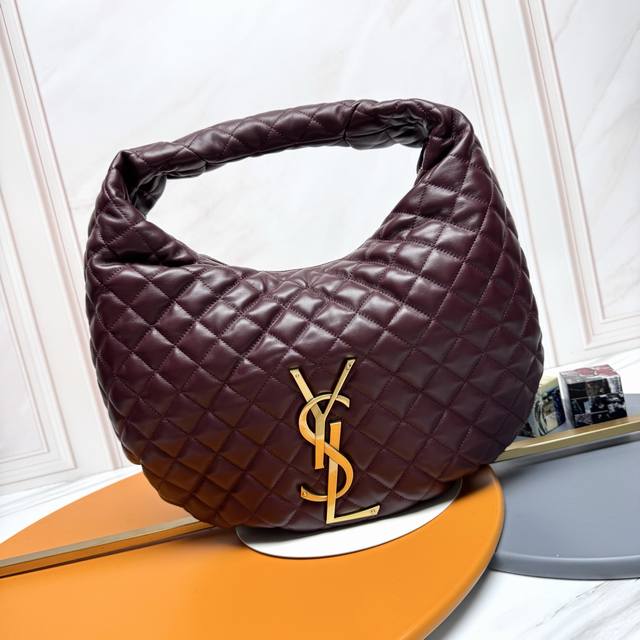 The highly anticipated Icare Baby Nappa lambskin handbag, featuring a striking c
