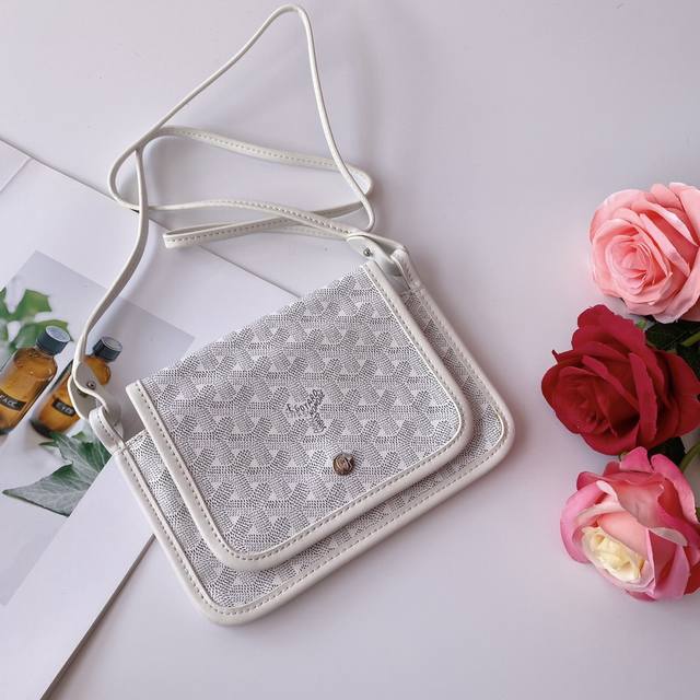 Goyar small crossbody bag, exuding French elegance. Made with custom-made Y-patt