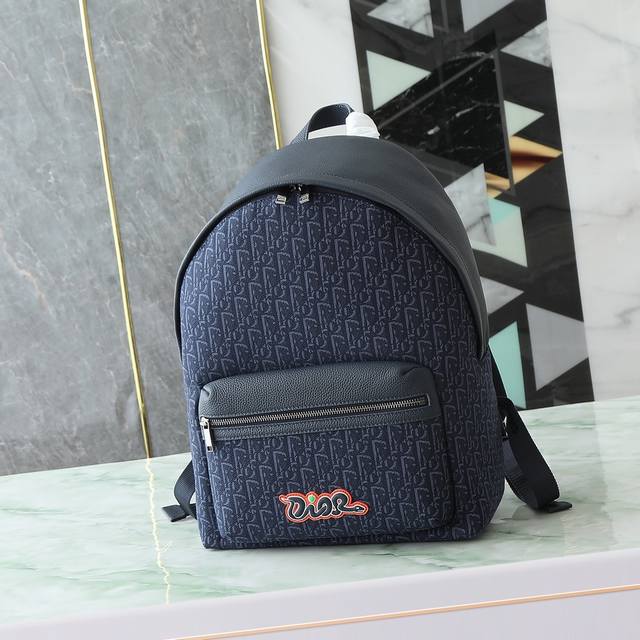 This Rider 2.0 zip-up backpack is from the Dior And Kaws limited edition collect