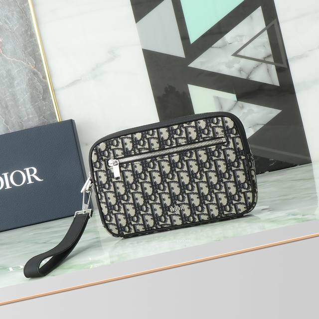 This toiletry bag is practical and exquisite. Crafted from beige and black jacqu