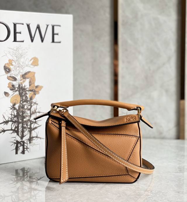 Lo*We Mini Caramel Color, a celebrity-endorsed bag made of imported lychee-textu