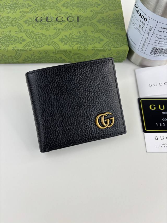 Guccl's new Gg Emblem series features ultra-soft pebbled black leather with doub
