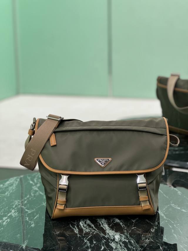 New Messenger Bag This messenger bag is designed with Re-Nylon recycled nylon fa