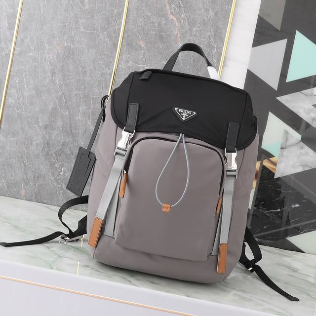 Exclusive First Look: 2Vz135 Backpack. This nylon backpack features Saffiano lea