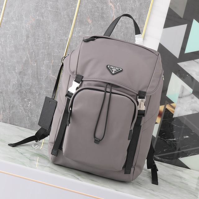 Exclusive First Look: 2Vz135 Backpack. This nylon backpack features Saffiano lea