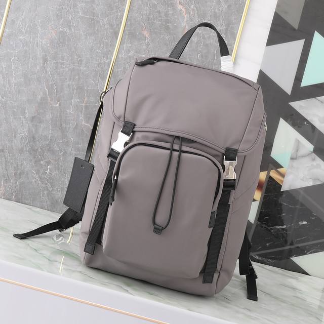 Exclusive First Look: 2Vz135 Backpack. This nylon backpack features Saffiano lea