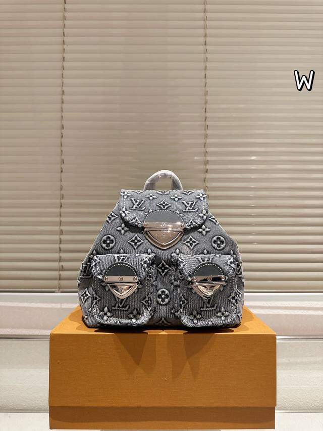 Louis Vuitton Embossed Denim Backpack, 21.19 with box, available on Ddd.