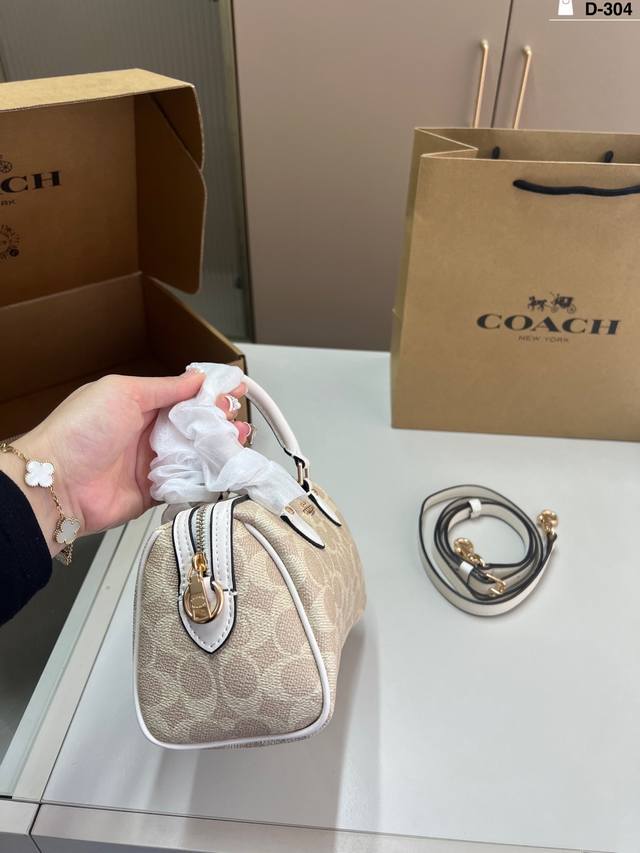 Coach pillow bag/handbag Classic design, stylish and versatile Can be carried by