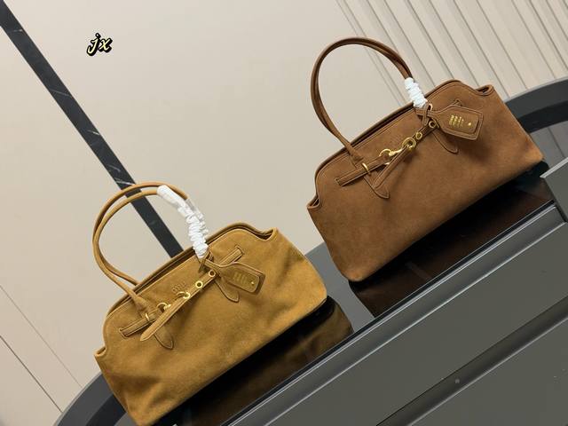 Comes with box. Size: 44.23cm. This is a vintage Miumiu tote bag. I especially l