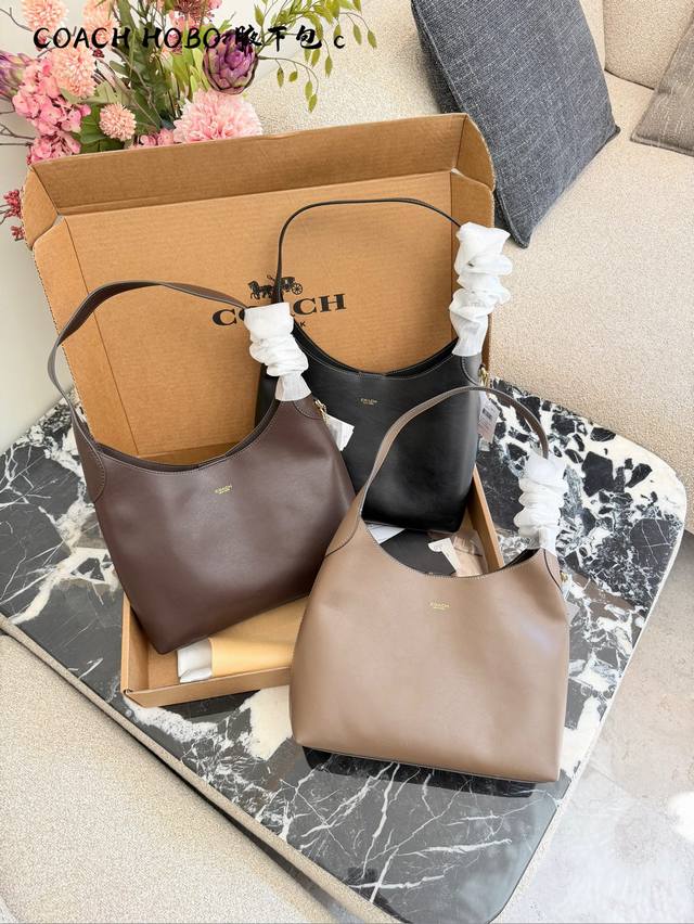 Coach Brooklyn 28 Shoulder Bag. This Coach Brooklyn 28 shoulder bag features sof