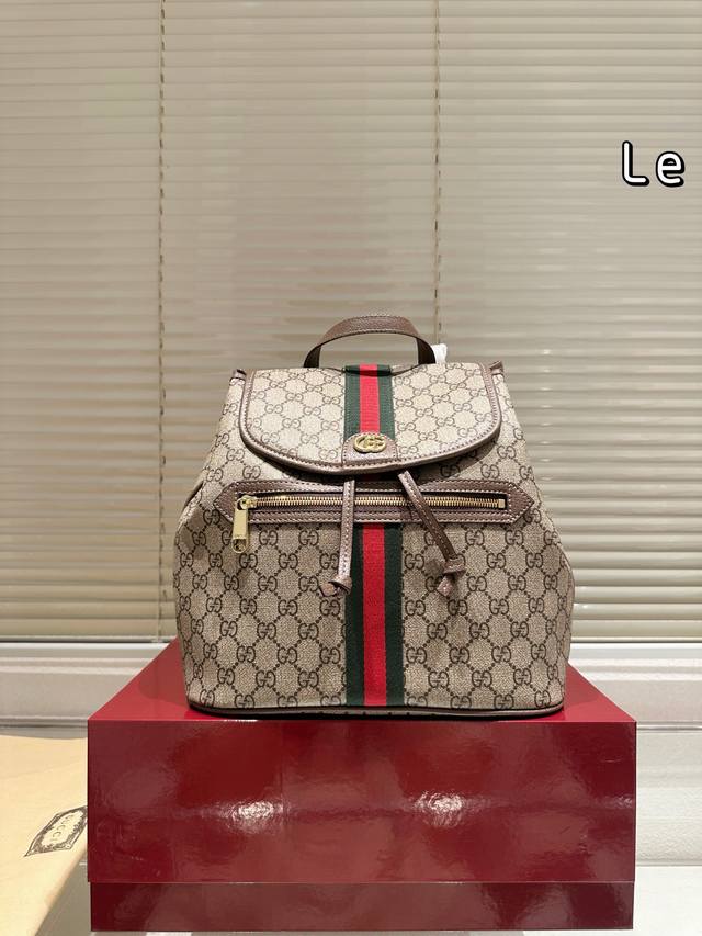 Gucci Ophidia Backpack; Made with classic GG Supreme canvas and brown leather tr