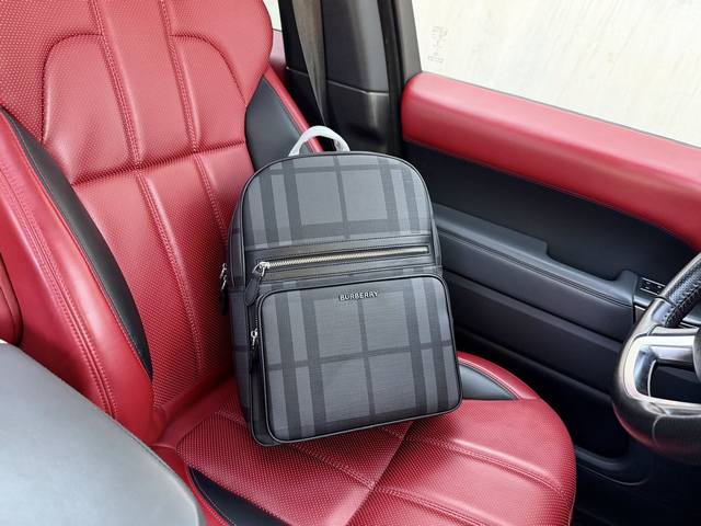 High-end new "Burberry" backpack. Features a checkered logo patch, zipper closur
