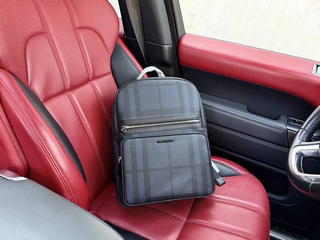 High-end new "Burberry" backpack. Features a checkered logo patch, zipper closur