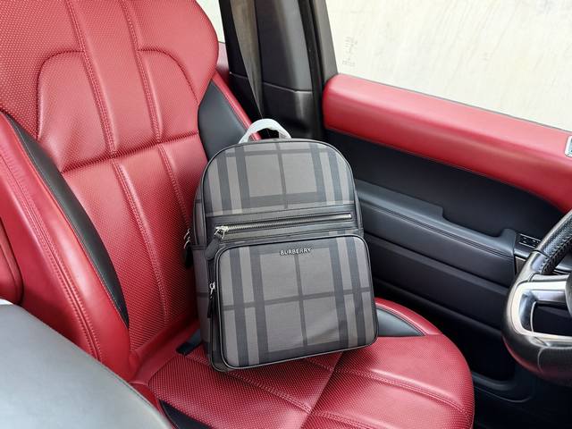 High-end new "Burberry" backpack. Features a checkered logo patch, zipper closur