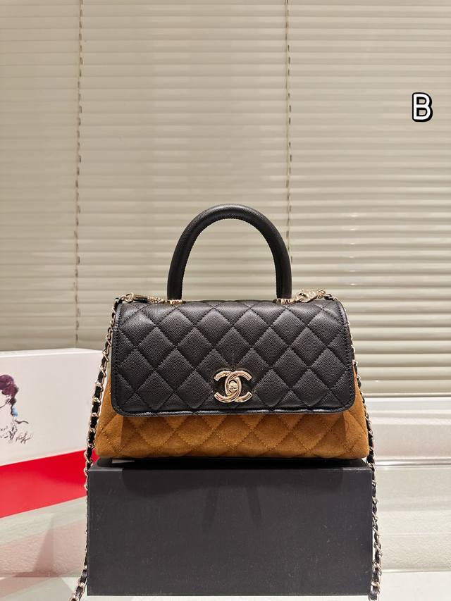 Suede Chanel Coco Handle Mini Handbag. This Chanel Coco Handle Mini handbag feat