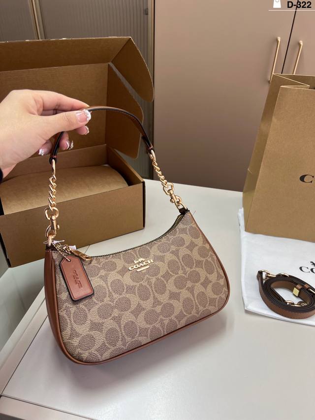 Coach Crescent Moon Box. The crescent moon shape is popular this year. Suitable