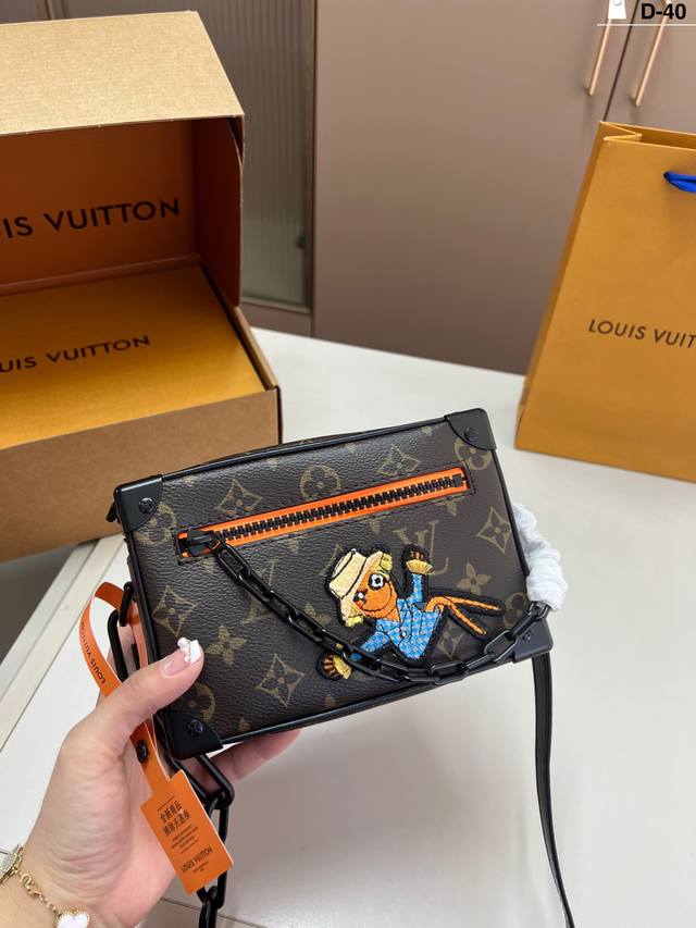 Lv Scarecrow Mini Soft Trunk Classic monogram soft trunk Suitable for both men a