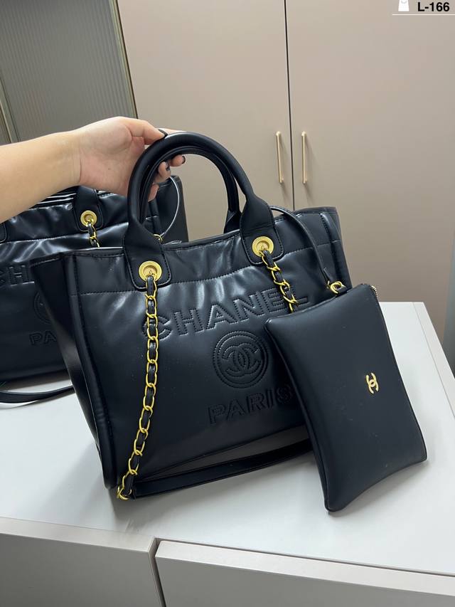 Small Chanel beach bag. Easily matches any outfit. Understated yet sophisticated