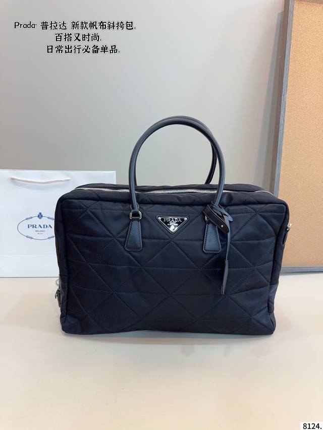 Prada Tote Bag Effortlessly embodies retro chic The bag has a structured shape,