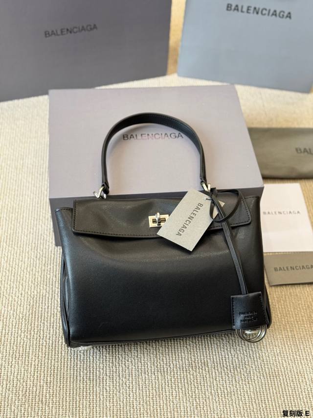 Replica Balenciaga Rodeo Handbag. Made of soft, glossy calfskin with silver hard