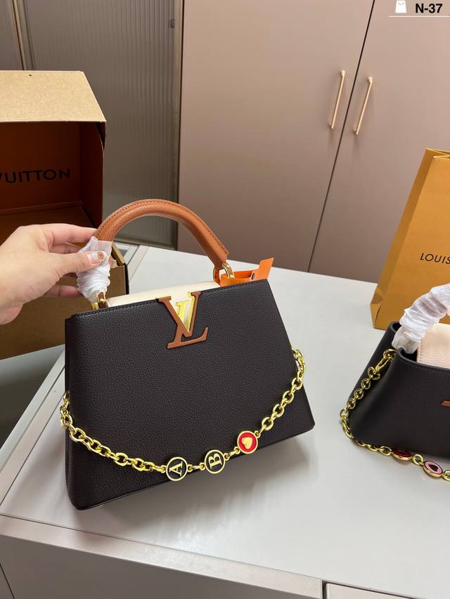 Large LV Capucines handbag, a must-have for a queenly look. Reasonable size, goo