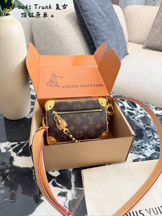 Mini Soft Trunk M14729 Vintage This mini soft trunk is made of Monogram coated c