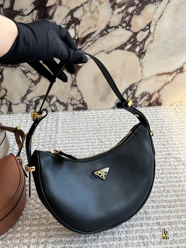 Prada's new Good fortune begins with this triangular logo People often say that