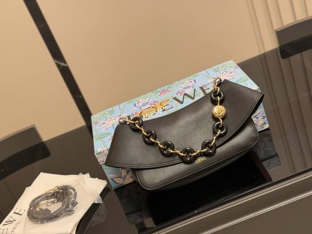 Loewe's new Ola all-leather version is now available! The first Ola was straw-wo