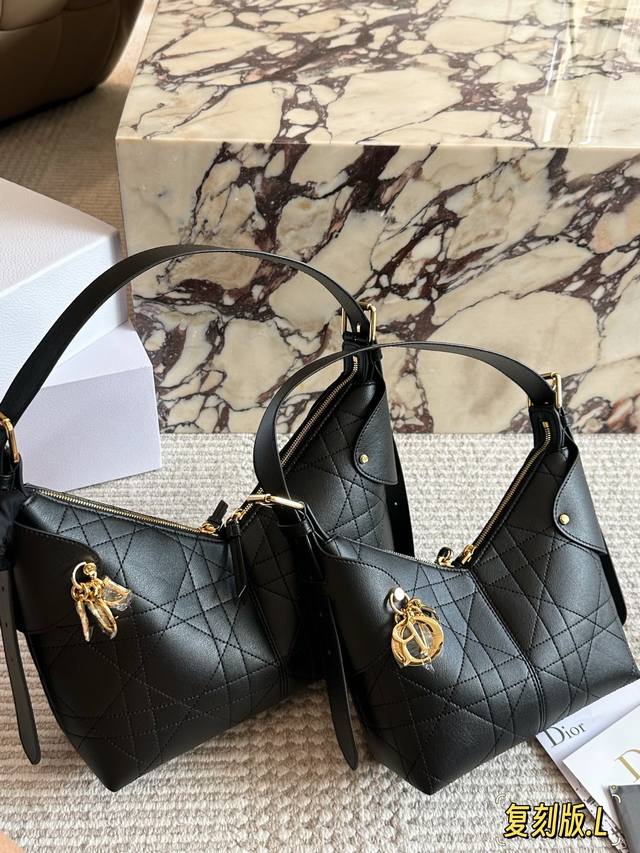 New Dior Voyage handbag, so cool! The new shape is sporty and exudes an irresist