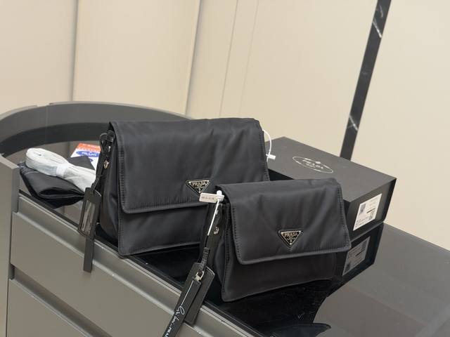 Prada messenger bag with folding box. Super spacious, unisex design. Simply put,
