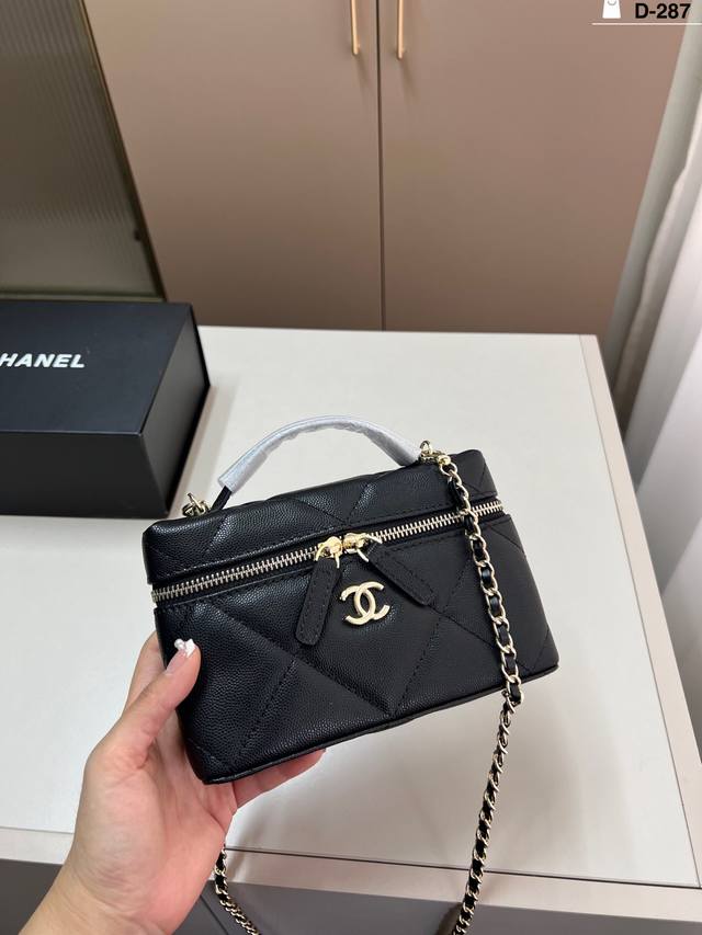 Cowhide Chanel Handle Makeup Bag. Can be worn on the shoulder or crossbody, show