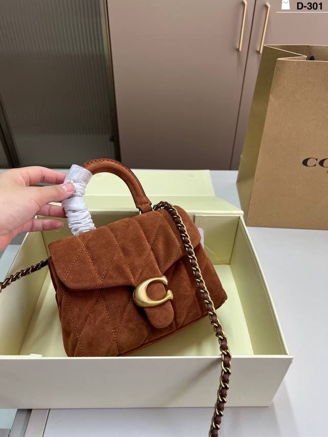 Coach's Tabby Family welcomes a new member! It perfectly embodies the sophistica