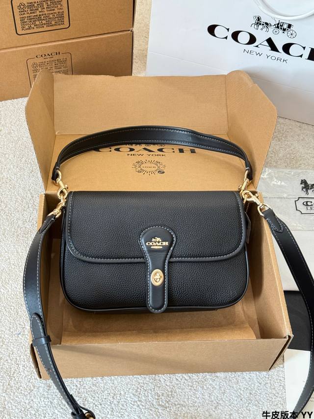 Cowhide Version Coach Hadley Baguette Bag. Made of pebbled calfskin leather, thi