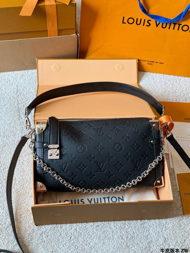 Leather version of the LV Side Trunk bag with black and silver embossed design.