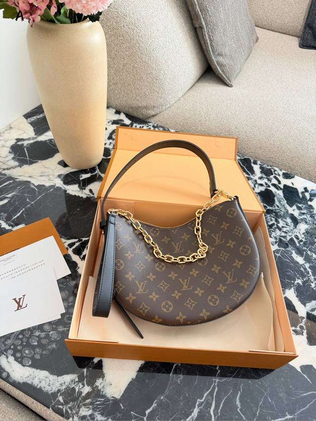 LV Cookie Bb Handbag (Ddd) The LV Cookie Bb handbag features classic Monogram ca