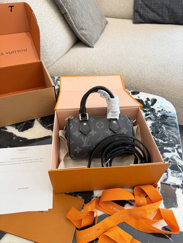 Original LV Nano Speedy Black Monogram Canvas Handbag. This LV Nano Speedy handb