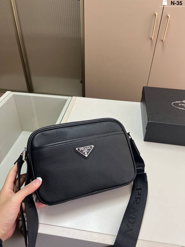 Genuine Leather Prada Camera Bag Stylish and trendy no matter how you style it.