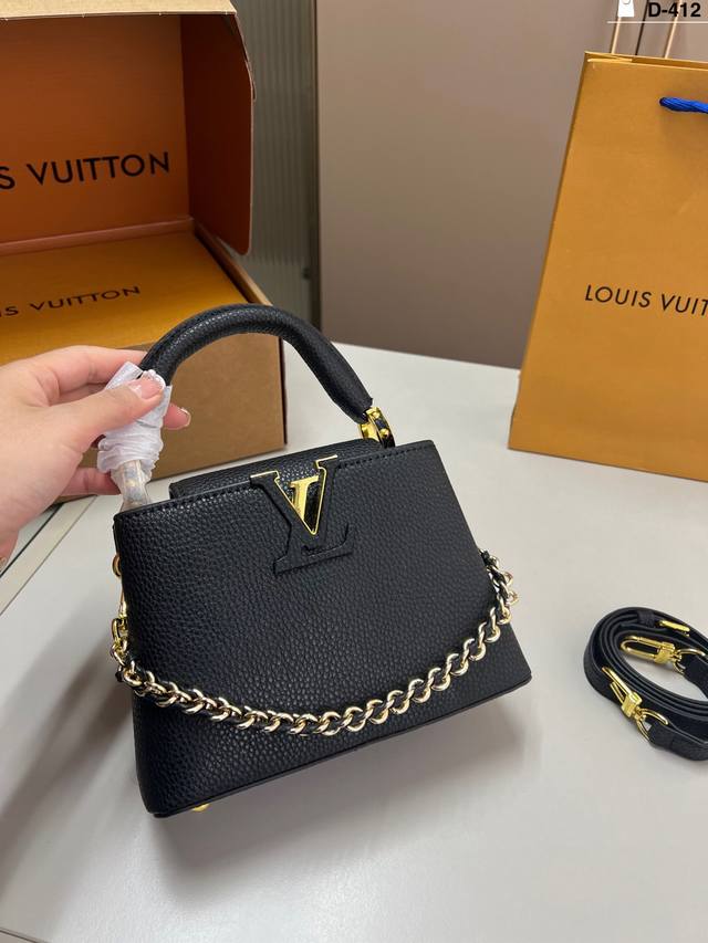 LV Capucines handbag A must-have for a queenly style. Reasonable size, good capa