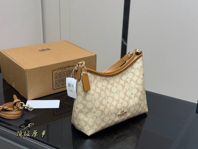 Replica version with airplane box. Size: 31*23cm. The new Coach Laurel hobo bag