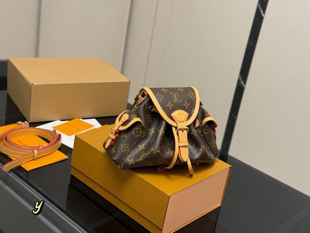 Comes with a folding box/airplane box. New LV Odyssee handbag. It's a bit like a