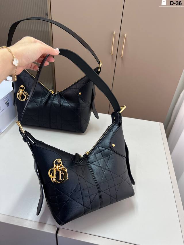 Little Ddd's new Dior Voyage handbag is so cool! The new bag shape is sporty and