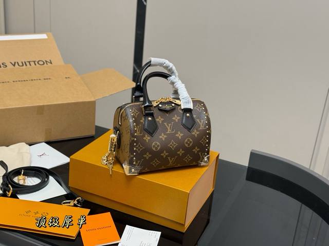 Comes with a folding box/airplane box. LV studded pillow bag. Simple, versatile,