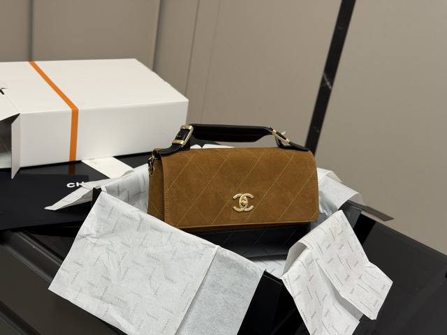 Comes with a folding box/airplane box. Chanel 25A suede brown messenger bag. A v