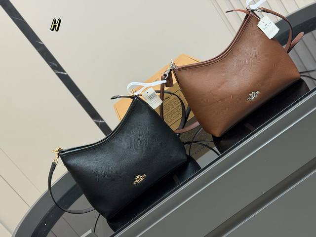 Comes with a box Size: 31*23Cm The new Coach Laurel hobo bag is absolutely gorge