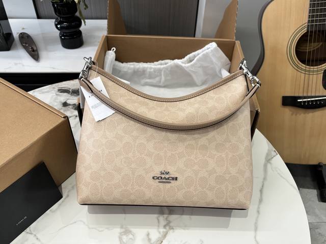 Replica version with airplane box. Size: 31*23cm. The new Coach Laurel hobo bag