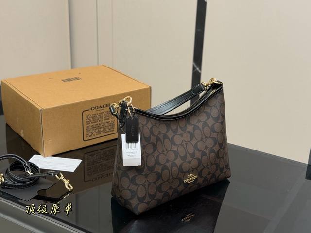 Replica version with airplane box. Size: 31*23cm. The new Coach Laurel hobo bag