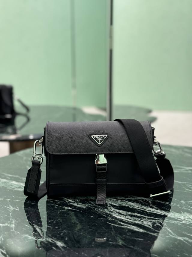 New Messenger Bag This shoulder bag is crafted from Re-Nylon recycled nylon and