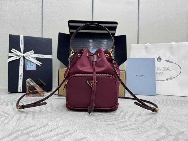 Classic best-selling style 1Bh038 in black has arrived! This bucket bag is made