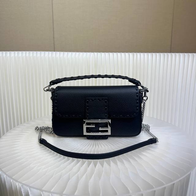 Authentic The iconic Baguette mini handbag, hand-stitched with 309 stitches in a