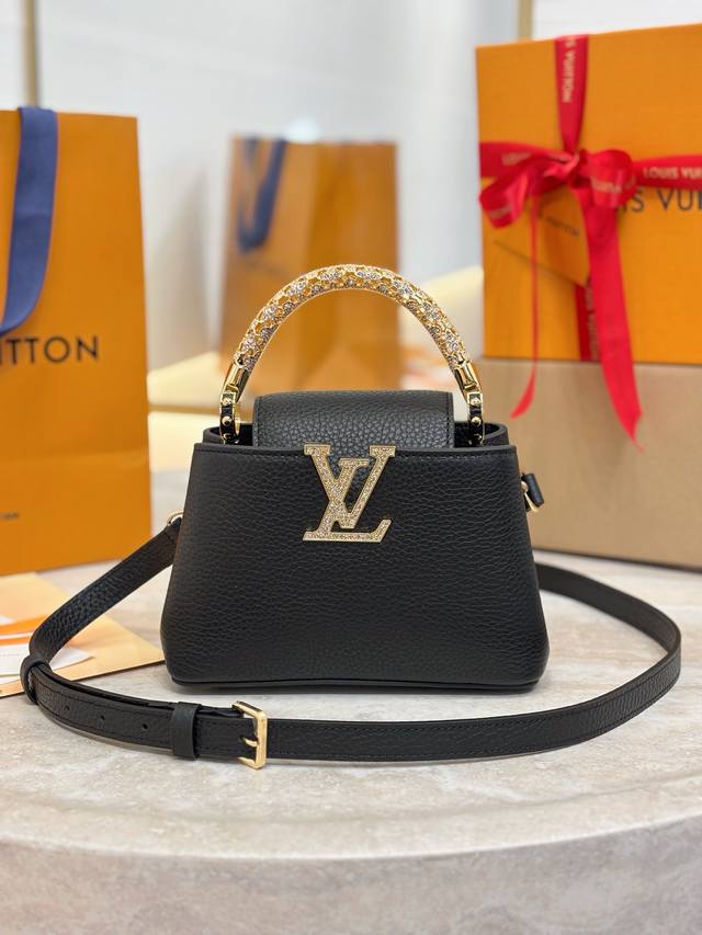 Capucines Mini Handbag M14177 Black This Capucines mini handbag is from the Exce